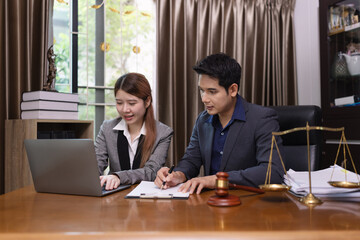 Two Lawyer with Document Paper and Hammer on Wood table,  Judge's Gavel, Law, Justice Symbol,...
