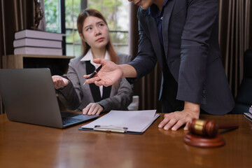 Two Lawyer with Document Paper and Hammer on Wood table,  Judge's Gavel, Law, Justice Symbol,...