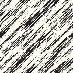 Abstract black and white grunge texture with diagonal brush strokes creating a distressed pattern for background design