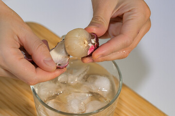 The Moment of Peeling a Lychee Fruit