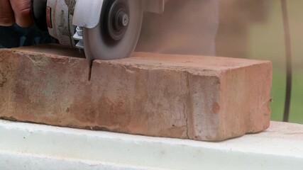 Close-Up of Brick Cutting with Power Grinder in Construction Process