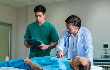 Doctor Examining Patient in Emergency Room