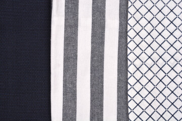 Three fabric swatches: a dark solid, a striped, and a diagonal grid pattern