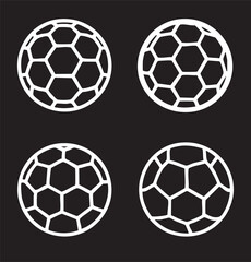 Fototapeta premium Four white soccer balls with hexagonal patterns on a black background