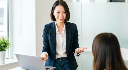 HR officer using both verbal explanation and visual aids during the recruitment process.