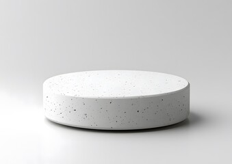 Minimalist speckled white cylinder platform for product display