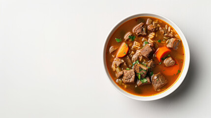 Isolated bowl of Armenian hash on white background, hearty soup with lamb, rice, and vegetables