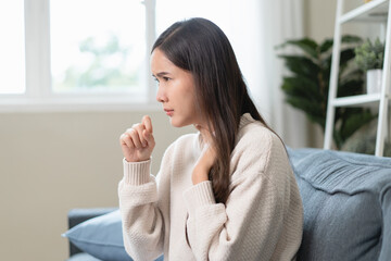 Women have a cough and a sore throat, and feel sick and cold.