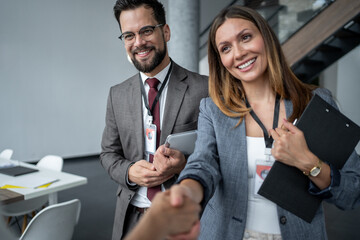 Business people shaking hands at conference meeting