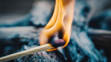 Close-up view of a burning matchstick.