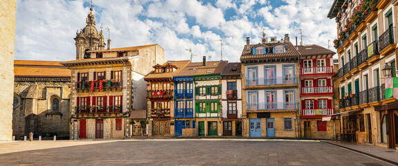 Main square of the Basque town of Hondarribia with its picturesque colorful houses and flower pots,...