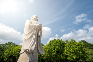 The Majestic Scene of the Confucius Statue Under a Blue Sky