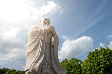 The Majestic Scene of the Confucius Statue Under a Blue Sky