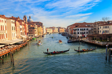 View of Grand Canal with gondolas and boats in Venice, Italy