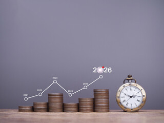 Vintage watch, Stack of coins with graph. The concept of business growth, Financial investment,...