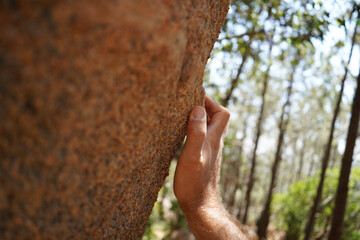Hand on Sharp Granite Boulder in Sintra Forest for Sport Bouldering