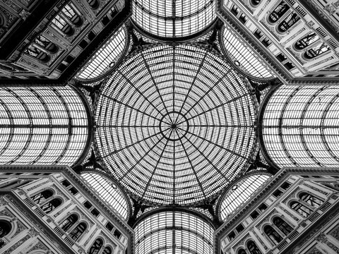 Intricate Glass Dome Ceiling of Galleria Umberto I in Naples, Italy, Showcasing Neorenaissance Architecture and Symmetrical Lines