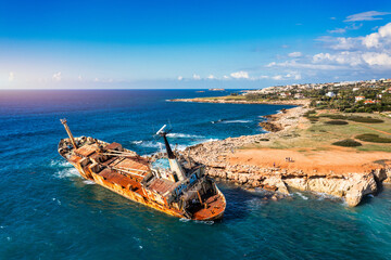 Abandoned Edro III Shipwreck at seashore of Peyia, near Paphos, Cyprus. Historic Edro III Shipwreck site on the shore of the water in Cyprus. Aerial view of Shipwreck EDRO III, Pegeia, Paphos.