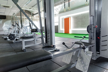 Modern Gym with Strength Training Equipment and Exercise Machines for Fitness and Bodybuilding