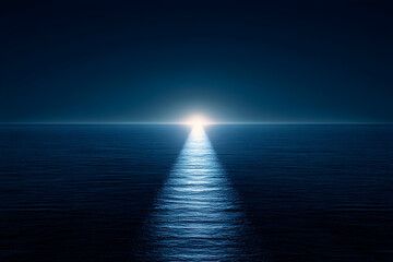 A bright light beam on dark ocean water at night.