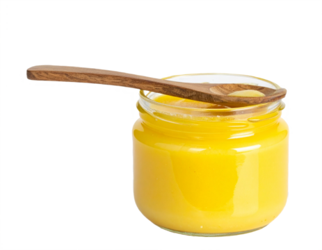Jar of ghee with wooden spoon, traditional clarified butter, culinary ingredient