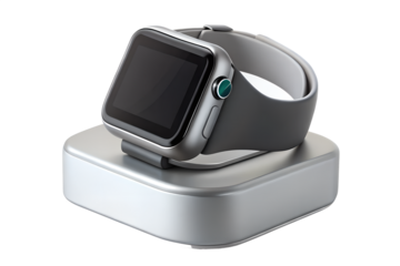 A modern silver smartwatch with a black strap rests on its charging dock, isolated on a transparent background