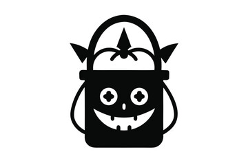 Black spooky monster pail filled with sweets is ready for trick or treat