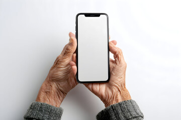 Elderly Hands Holding Smartphone with Blank Screen Against a White Background