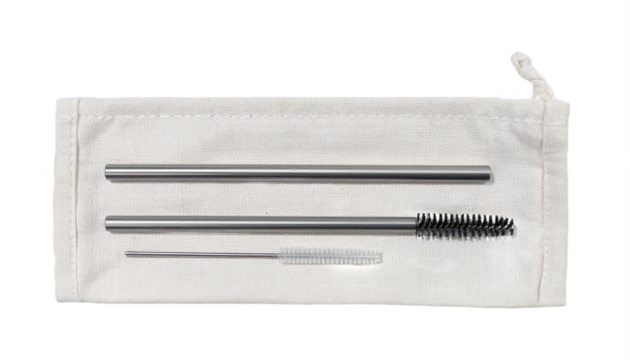 Reusable metal straws and cleaning brushes set inside a drawstring bag for sustainable lifestyle
