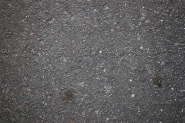 High Resolution Close-up Texture of Dark Asphalt Pavement Material Construction, Ideal for