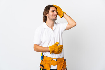 Young electrician man over isolated background smiling a lot