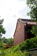 The Harmonious Beauty of Ancient Architecture and Lush Greenery