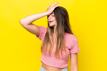 Young caucasian woman isolated on yellow background has realized something and intending the...