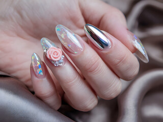 Elegant, Detailed Nail Art Design with Shimmering and Metallic Accents
