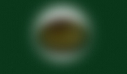 Abstract egg shape with green background and blurred center