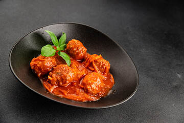 Meatballs tomato sauce beef, pork or chicken meat fresh delicious gourmet food background on the table rustic food top view copy space keto and paleo diet