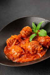 Meatballs tomato sauce beef, pork or chicken meat fresh delicious gourmet food background on the table rustic food top view copy space keto and paleo diet