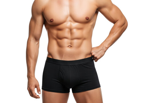 A fit man with defined abs poses in black boxer briefs against a white backdrop