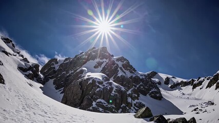 Striking 4K time lapse showing sunlight glimmering snow crowned summit rugged rock faces sparkling clouds drift capturing grandeur inspiration adventure brands motivational slides geography - Powered by Adobe