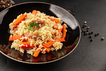 Rice meat and vegetables pilaf fresh delicious gourmet food background on the table rustic food top view copy space