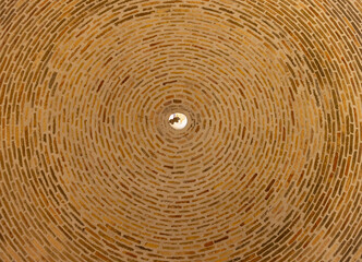 Fototapeta premium the arch of voussoir in Samanid mausoleum, the oldest building of Bukhara, Uzbekistan