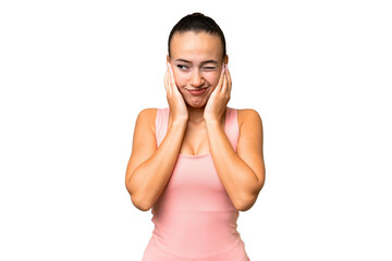 Young Arab woman over isolated background frustrated and covering ears