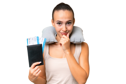 Young Arab woman with Inflatable Travel Pillow over isolated background thinking