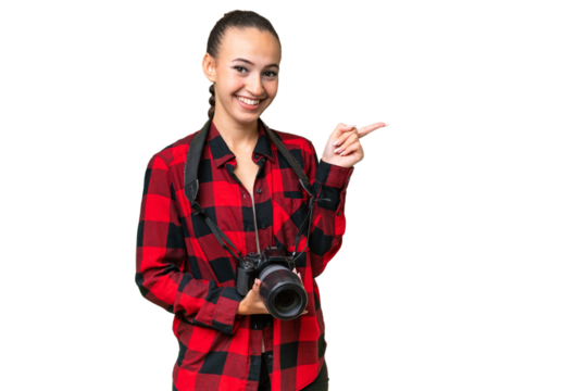 Young photographer Arab woman over isolated background pointing finger to the side