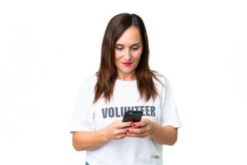 Middle age volunteer woman over isolated chroma key background sending a message with the mobile