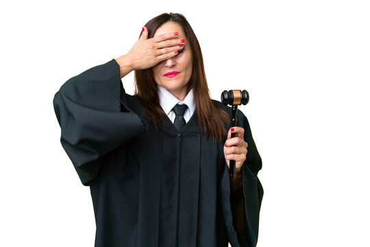 Judge caucasian woman over isolated background covering eyes by hands. Do not want to see something