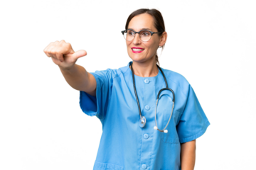 Middle-aged nurse woman over isolated background giving a thumbs up gesture