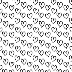 Fototapeta premium Black heart seamless pattern. Black and white ink brush hearts hand drawn ornament. 