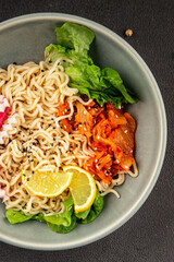 Noodle Bowl vegan fresh delicious gourmet food background on the table rustic food top view copy space keto and paleo diet vegan and vegetarian food