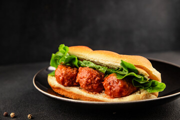 Meatball sandwich fast food meat dish fresh delicious gourmet food background on the table rustic food top view copy space